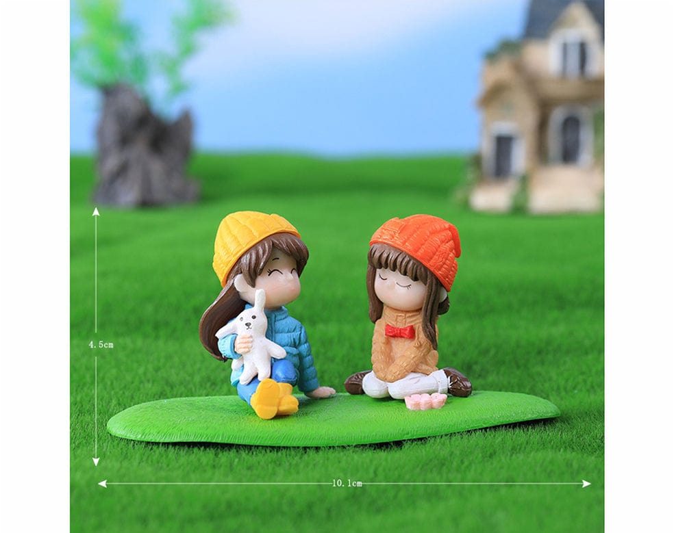 my store MINIATURE 2 GIRL SEATING ON A GRASS - A MINIATURE